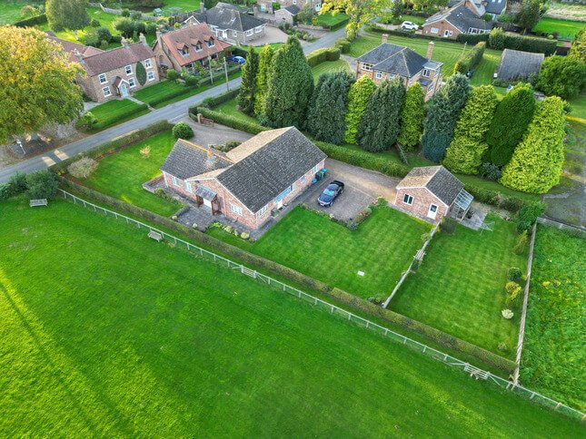 side view aerial picture of bungalow property